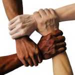 Diversity shown through holding hands