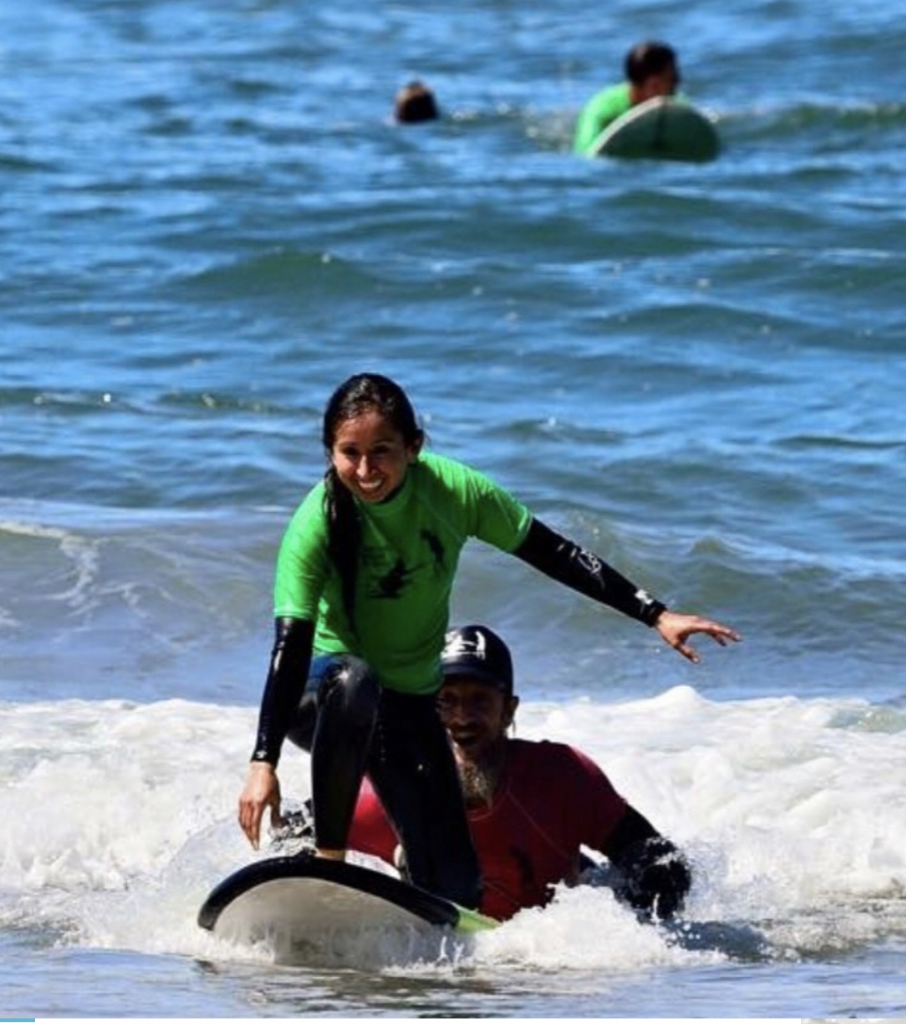 Photograph of girl surfing