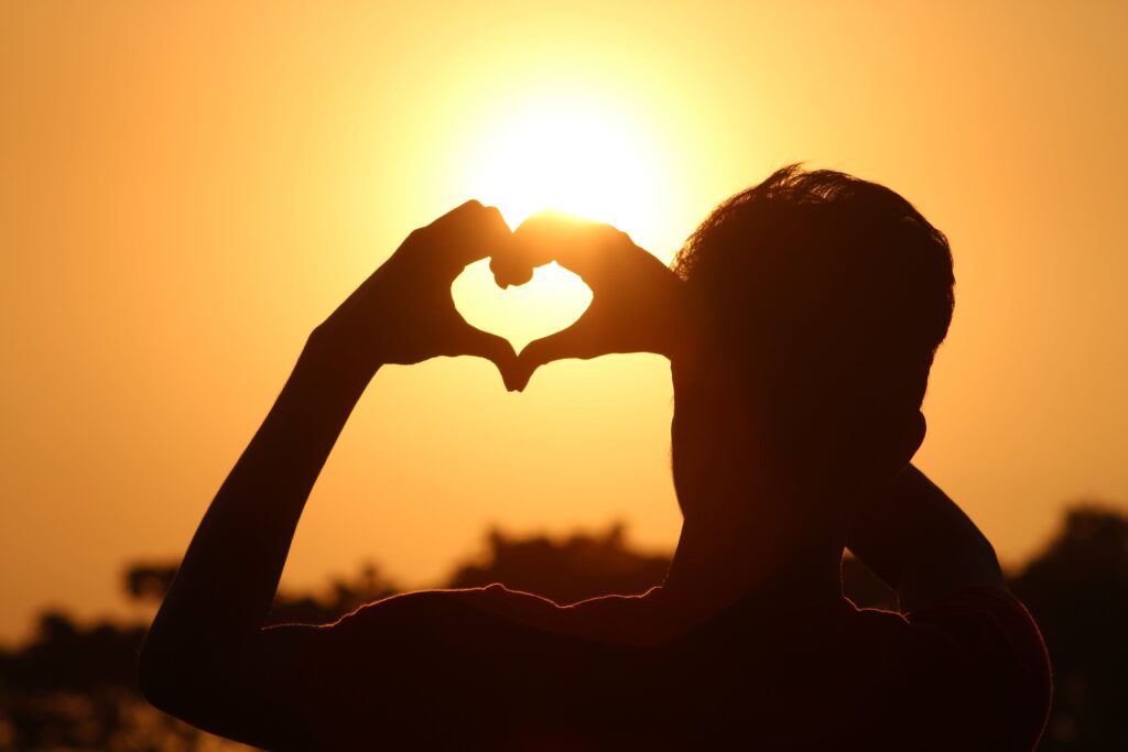 Figure 1 Photograph by Shihab Nymur: https://www.pexels.com/photo/silhouette-photo-of-man-doing-heart-sign-during-golden-hour-712520/CCO